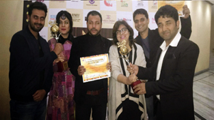 Team members of Mantostaan posing for group photograph after receiving Best Film Critics Award. Team members of Mantostaan posing for group photograph after receiving Best Film Critics Award.
