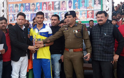 Winner receiving man of the match award at Sports Stadium in Kathua on Thursday. Winner receiving man of the match award at Sports Stadium in Kathua on Thursday.