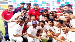 Ranji Trophy champions Gujarat cricket team posing for a group photograph at Indore on Saturday. Ranji Trophy champions Gujarat cricket team posing for a group photograph at Indore on Saturday.