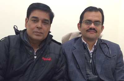 Dr Ujjval Chandra Mehrotra, Interventional Cardiologist and Electro-physiologist posing with patient. Dr Ujjval Chandra Mehrotra, Interventional Cardiologist and Electro-physiologist posing with patient.