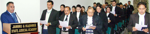 Director Judicial Academy administering oath to Advocates. Director Judicial Academy administering oath to Advocates.