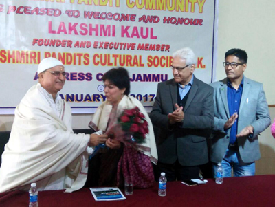 Founder of KPCS London, Lakshmi Kaul being honoured by Kashmiri Pandit leaders in Jammu on Monday. Founder of KPCS London, Lakshmi Kaul being honoured by Kashmiri Pandit leaders in Jammu on Monday.