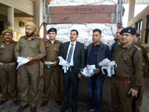 Polythene bags sized by Excise Department sleuths at Lakhanpur on Wednesday. Polythene bags sized by Excise Department sleuths at Lakhanpur on Wednesday.