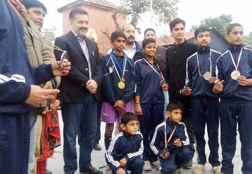 Minister for Sports Imran Raza Ansari posing with medal winners of Jump Rope in Jammu on Wednesday. Minister for Sports Imran Raza Ansari posing with medal winners of Jump Rope in Jammu on Wednesday.
