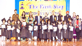 Children of The Narula First Step School posing for a group photograph while celebrating Annual Day. Children of The Narula First Step School posing for a group photograph while celebrating Annual Day.