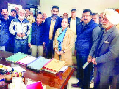 A delegation of refugee leaders and sarpanchs posing with DC Samba. A delegation of refugee leaders and sarpanchs posing with DC Samba.