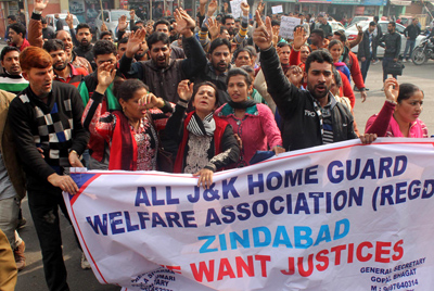 Home guards raising slogans during protest at Jammu on Thursday. —Excelsior/Rakesh Home guards raising slogans during protest at Jammu on Thursday. —Excelsior/Rakesh