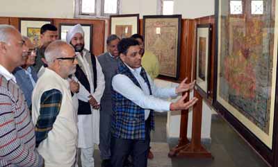 Minister of Public Works Naeem Akhtar looking at the art work on display at Kala Kendra on Saturday. Minister of Public Works Naeem Akhtar looking at the art work on display at Kala Kendra on Saturday.