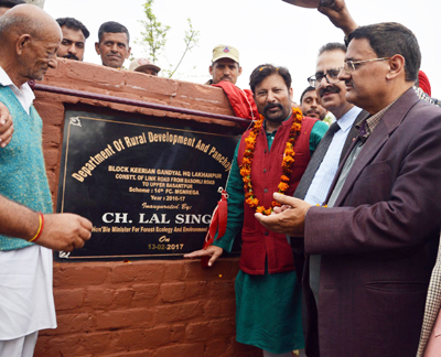 Minister for Forest Choudhary Lal Singh laying foundation of link road in Kathua on Tuesday. Minister for Forest Choudhary Lal Singh laying foundation of link road in Kathua on Tuesday.