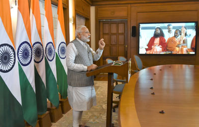 Prime Minister, Narendra Modi addressing the inaugural function of Annual International Yoga Festival at Rishikesh, through video conferencing, in New Delhi on Thursday. Prime Minister, Narendra Modi addressing the inaugural function of Annual International Yoga Festival at Rishikesh, through video conferencing, in New Delhi on Thursday.