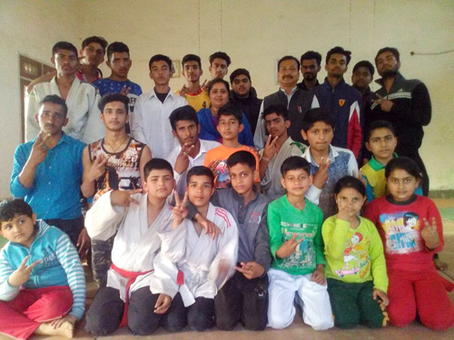 Players posing for a group photograph during concluding ceremony of District Kathua Judo Championship on Tuesday. Players posing for a group photograph during concluding ceremony of District Kathua Judo Championship on Tuesday.