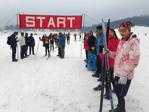 Skiers in action during National Nordic Ski Championship at Gulmarg. Skiers in action during National Nordic Ski Championship at Gulmarg.