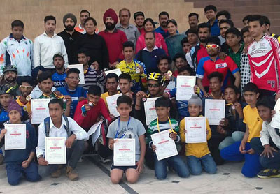 Winners posing alongwith dignitaries during prize distribution function of State Cycling Championship in Jammu. Winners posing alongwith dignitaries during prize distribution function of State Cycling Championship in Jammu.