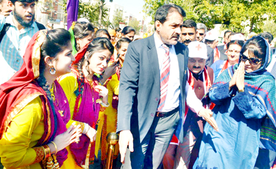 Chief Minister Mehbooba Mufti being welcomed for inauguration of Red Cross Mela at Jammu on Saturday. -Excelsior/Rakesh