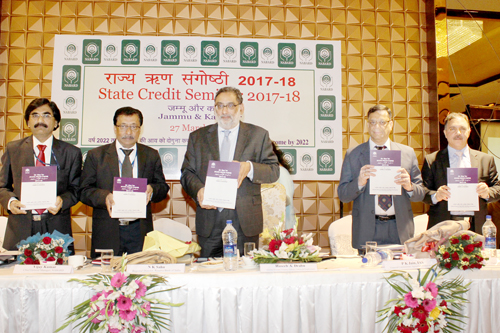 page3 Finance Minister, Dr Haseeb Drabu releasing State Focus Paper 2017-18 prepared by NABARD on Monday.