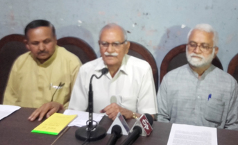 RSS functionaries addressing press conference at Jammu on Monday.