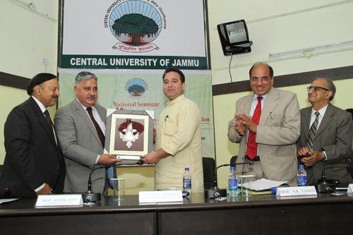 CUJ VC presenting memento to MoS Sunil Sharma during inaugural of a seminar on Monday.