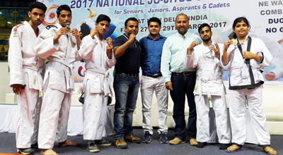 Medal winners of National Ju-Jitso Championship posing for a photograph. Medal winners of National Ju-Jitso Championship posing for a photograph.