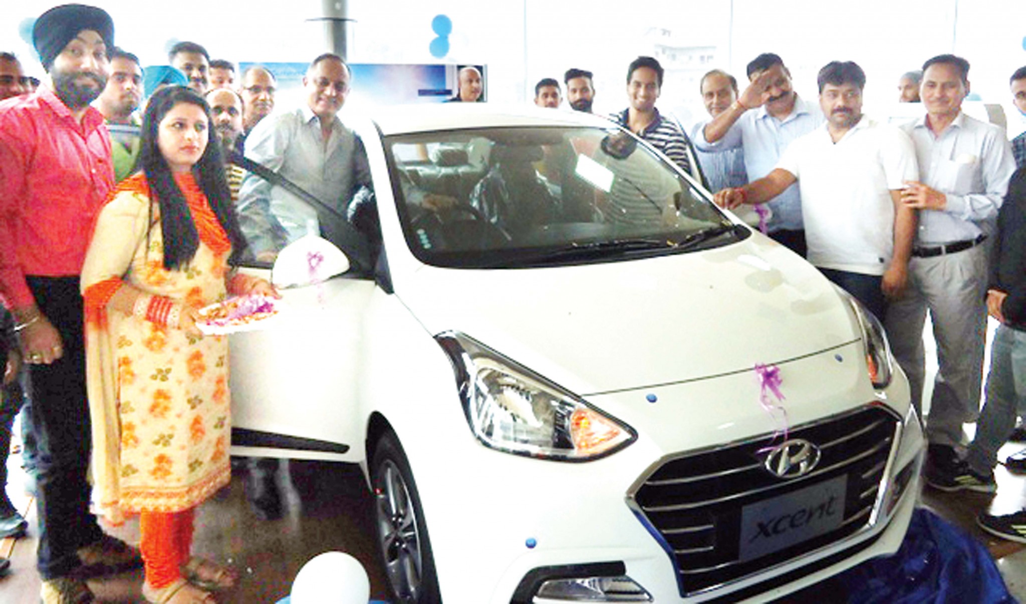 The officials of KC Hyundai Jammu and HMIL unveiling the all new Xcent car in Jammu on Saturday. The officials of KC Hyundai Jammu and HMIL unveiling the all new Xcent car in Jammu on Saturday.