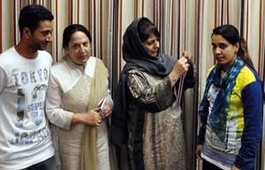 CM Mehbooba Mufti felicitating International Teakwondo silver madallist Mansha Bashir in Jammu on Wednesday. CM Mehbooba Mufti felicitating International Teakwondo silver madallist Mansha Bashir in Jammu on Wednesday.