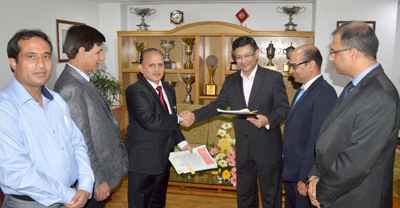 S S Sehgal, Executive President J&K Bank and Sanjay Datta, partner Delloitte Touche Tohmatsu India exchanging documents of agreement.