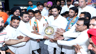 AIYC chief Amrinder Singh Raja being felicitated by PCC, chief GA Mir and others during party function in Jammu on Tuesday. AIYC chief Amrinder Singh Raja being felicitated by PCC, chief GA Mir and others during party function in Jammu on Tuesday.