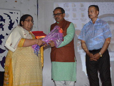 Deputy Chief Minister Dr Nirmal Singh honouring family member of martyr. Deputy Chief Minister Dr Nirmal Singh honouring family member of martyr.