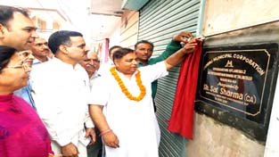 MLA Jammu West, Sat Sharma inaugurating newly constructed lanes and drains in Talab Tillo area of Jammu. MLA Jammu West, Sat Sharma inaugurating newly constructed lanes and drains in Talab Tillo area of Jammu.