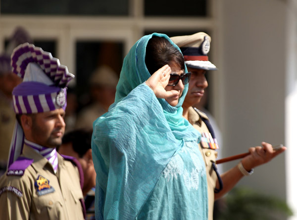 Chief Minister Mehbooba Mufti taking guard of honour at Civil Secretariat after reopening of Government offices in Srinagar on Monday. -Excelsior/Shakeel Chief Minister Mehbooba Mufti taking guard of honour at Civil Secretariat after reopening of Government offices in Srinagar on Monday. -Excelsior/Shakeel