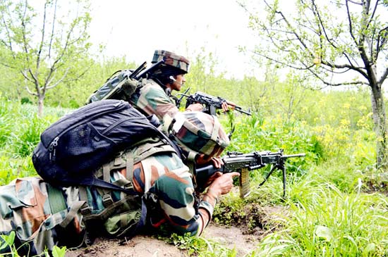Army personnel in action during search operation at Shopian on Thursday. -Excelsior/Younis Khaliq Army personnel in action during search operation at Shopian on Thursday. -Excelsior/Younis Khaliq