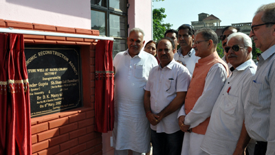 Speaker Kavinder Gupta and PHE Minister Sham Choudhary dedicating tube well to people. Speaker Kavinder Gupta and PHE Minister Sham Choudhary dedicating tube well to people.