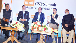 Finance Ministers of J&K, Assam, Kerela and Karnataka during a conference on Friday. Finance Ministers of J&K, Assam, Kerela and Karnataka during a conference on Friday.