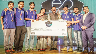 Winning team of SMVDU displaying award money. Winning team of SMVDU displaying award money.