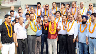 Som Nath Khajuria, re-elected Chairman of MES Builders Association of India, Jammu Chapter posing for photograph with other members of the Association. Som Nath Khajuria, re-elected Chairman of MES Builders Association of India, Jammu Chapter posing for photograph with other members of the Association.