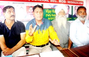 Members of Ex-Paramilitary Forces Welfare Association addressing a press conference at Jammu on Friday. Members of Ex-Paramilitary Forces Welfare Association addressing a press conference at Jammu on Friday.