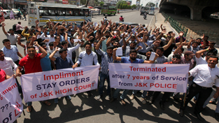 Ousted wireless operators taking out a protest rally in Jammu. -Excelsior/Rakesh Ousted wireless operators taking out a protest rally in Jammu. -Excelsior/Rakesh