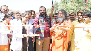 HoD Cardiology Dr Sushil Sharma and Swami Vishwatamanand Ji inaugurating free cardiac camp in Rajouri on Sunday.