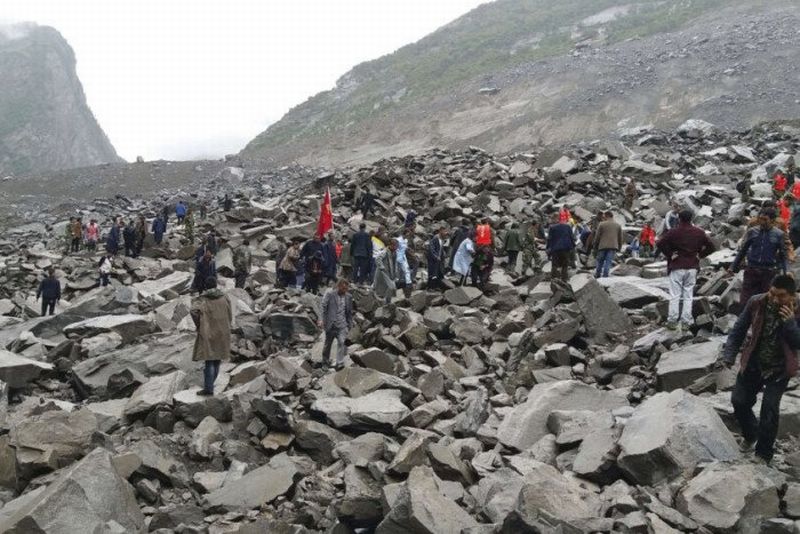 Six killed, over 100 missing as landslide buries mountain village in China Six killed, over 100 missing as landslide buries mountain village in China
