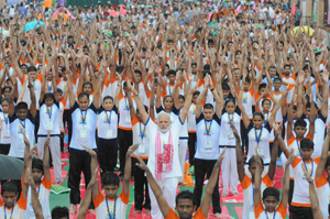 Prime Minister Narendra Modi with participants doing Yoga on the occasion of 3rd International Day of Yoga in Lucknow on Wednesday. (UNI) Prime Minister Narendra Modi with participants doing Yoga on the occasion of 3rd International Day of Yoga in Lucknow on Wednesday. (UNI)