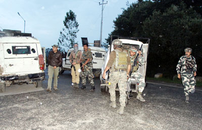Security forces in action during encounter in Pazalpora area of Sopore on Wednesday. -Excelsior/ Aabid Nabi Security forces in action during encounter in Pazalpora area of Sopore on Wednesday. -Excelsior/ Aabid Nabi