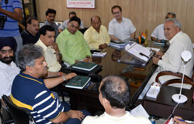 Minister for PHE, Irrigation & Flood Control Sham Lal Choudhary chairing a meeting at Jammu on Thursday. Minister for PHE, Irrigation & Flood Control Sham Lal Choudhary chairing a meeting at Jammu on Thursday.