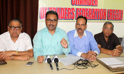 Chamber of Traders Federation president, Neeraj Anand, and others, addressing a press conference at Jammu on Wednesday. — Excelsior/Rakesh Chamber of Traders Federation president, Neeraj Anand, and others, addressing a press conference at Jammu on Wednesday. — Excelsior/Rakesh