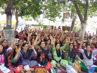 Female Multipurpose Health Workers staging protest at Madam Shashi Bala Memorial Park in Jammu. Female Multipurpose Health Workers staging protest at Madam Shashi Bala Memorial Park in Jammu.