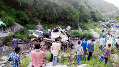The illfated vehicle, which fell into a deep gorge in Thatri area of Doda district. -Excelsior/Tilak Raj The illfated vehicle, which fell into a deep gorge in Thatri area of Doda district. -Excelsior/Tilak Raj