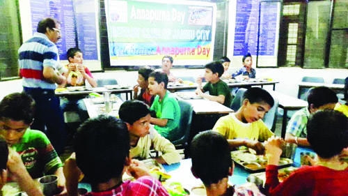 Members of Rotary Club of Jammu city serving food to inmates of Balgran in Jammu. Members of Rotary Club of Jammu city serving food to inmates of Balgran in Jammu.