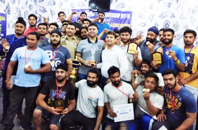 Medal winners of State Powerlifting Championship posing along with dignitaries in Jammu. Medal winners of State Powerlifting Championship posing along with dignitaries in Jammu.