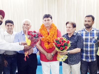 Re-elected president of J&K Yoga Association, Deepak Handa and other dignitaries after his election on Sunday. Re-elected president of J&K Yoga Association, Deepak Handa and other dignitaries after his election on Sunday.
