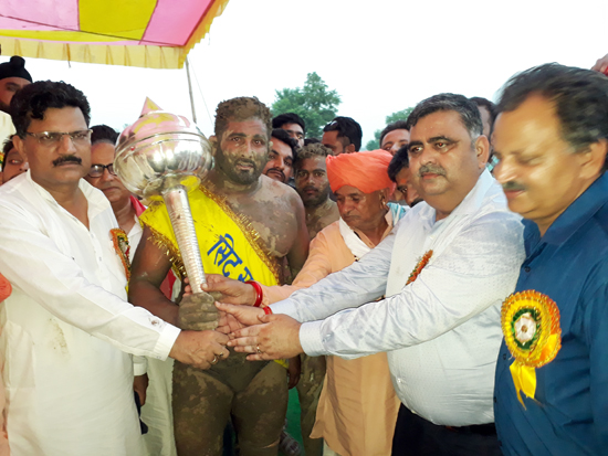 Winner of 1st bout of Siddh Swankha Kesari Dangal 2017 being felicitated by the chief guest in Samba on Monday. Winner of 1st bout of Siddh Swankha Kesari Dangal 2017 being felicitated by the chief guest in Samba on Monday.