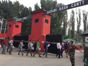 Youth entering into Army area for appearing in a written examination conducted for recruitment in Territorial Army, at Srinagar. Youth entering into Army area for appearing in a written examination conducted for recruitment in Territorial Army, at Srinagar.