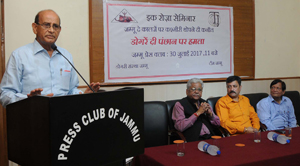 Dogri writer Prof Lalit Magotra addressing a seminar by Dogri Sanstha and Team Jammu on Sunday. —Excelsior/Rakesh Dogri writer Prof Lalit Magotra addressing a seminar by Dogri Sanstha and Team Jammu on Sunday. —Excelsior/Rakesh